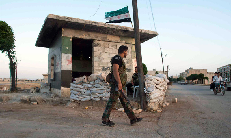 تعبيرية، لمقاتل من الجيش الحر في مارع شمال حلب عام 2012