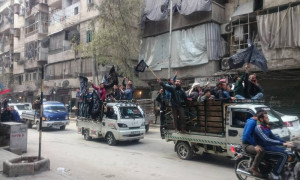 سيارات تابعة لحزب التحرير تحمل متظاهرين إلى حي الصالحين في حلب - الجمعة 18 آذار