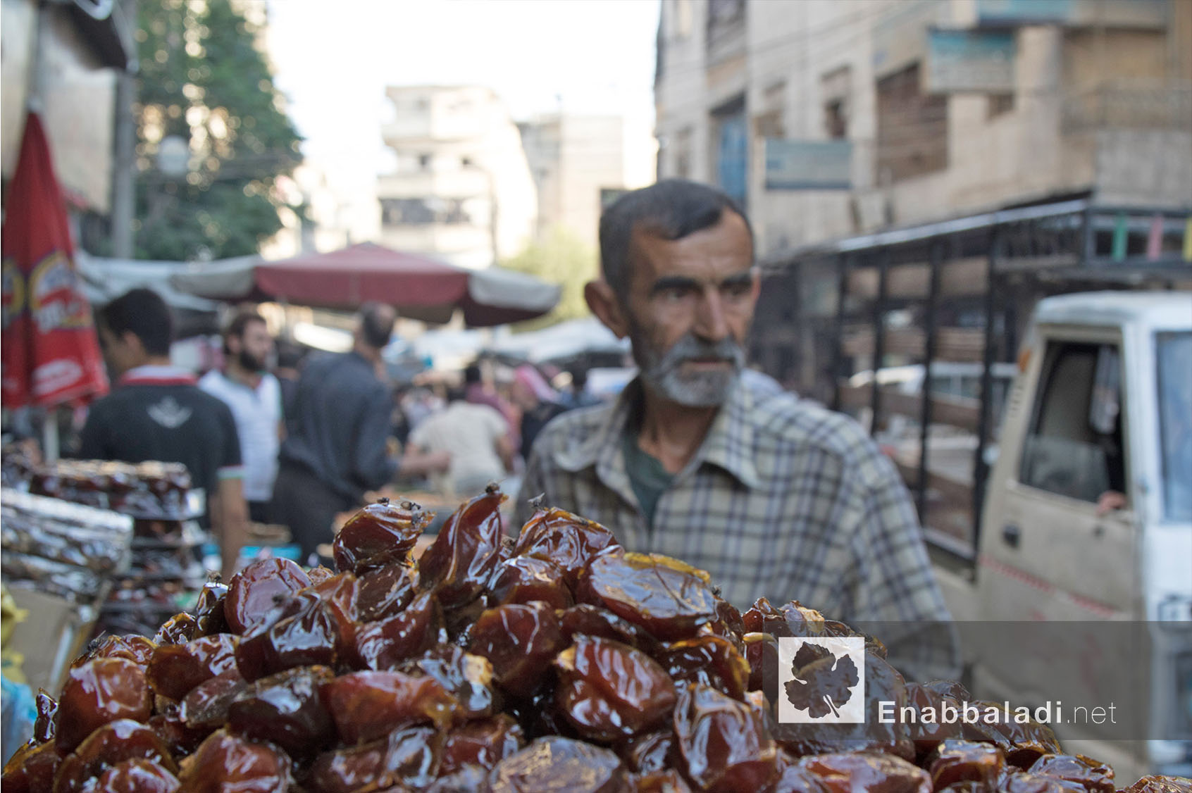 بائع تمر في مدينة حلب خلال رمضان - 13 حزيران 2016 - (عنب بلدي)