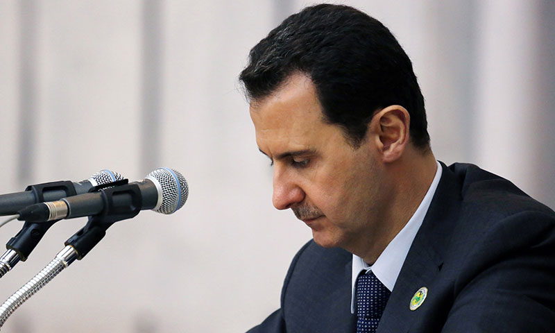 رئيس النظام السوري، بشار الأسد في اجتماع نقابة المحامين في دمشق (سانا)