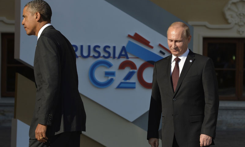 الرئيس الأمريكي باراك باراك أوباما ونظيره الروسي فلاديمير بوتين (AFP)