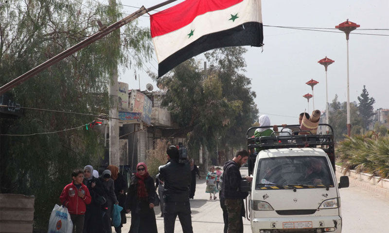 أحد حواجز النظام في دمشق في 2014 (AFP)