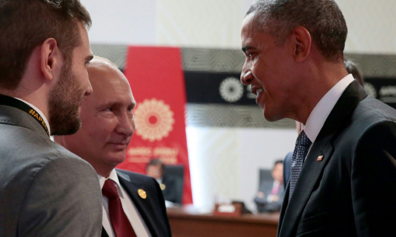 الرئيسان الأمريكي باراك أوباما والروسي فلاديمير بوتين_20 تشرين الثاني - (AFP)