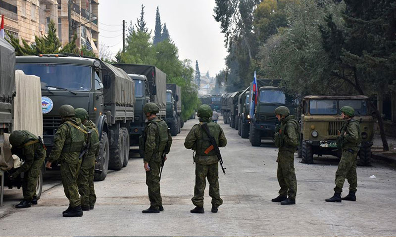 جنود وشاحنات روسية داخل مدينة حلب- الأحد 4 كانون الأول (سانا)