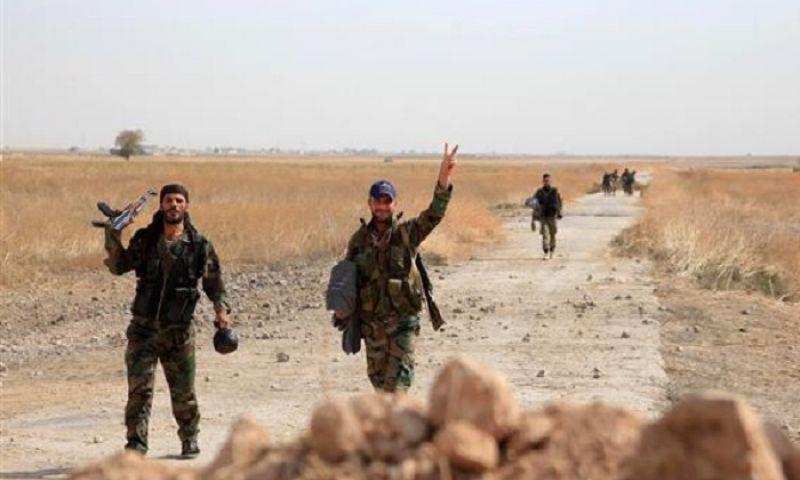 عناصر من قوات الأسد في محيط مطار كويرس_(انترنت)