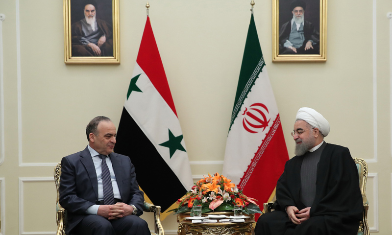 رئيس الوزراء السوري، عماد خميس، في اجتماع مع الرئيس الإيراني حسن روحاني في طهران - 18 كانون الثاني 2017 (AFP)