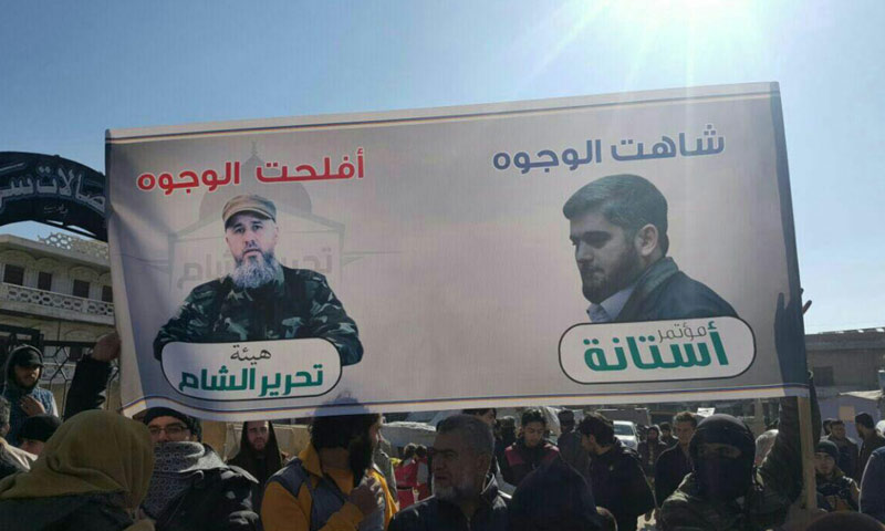 لافتة رفعها متظاهرون في بلدة الدانا بريف إدلب- الجمعة 3 شباط (تويتر)