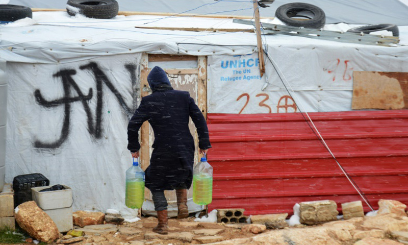لاجئ سوري في إحدى المخيمات اللبنانية_(AFP)
