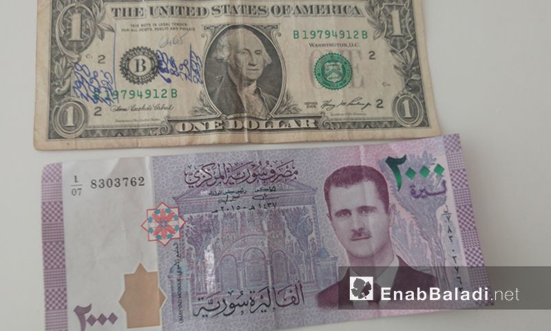 عملة سورية من فئة ألفي ليرة وتعادل قرابة 4 دولارات أمريكية (عنب بلدي)