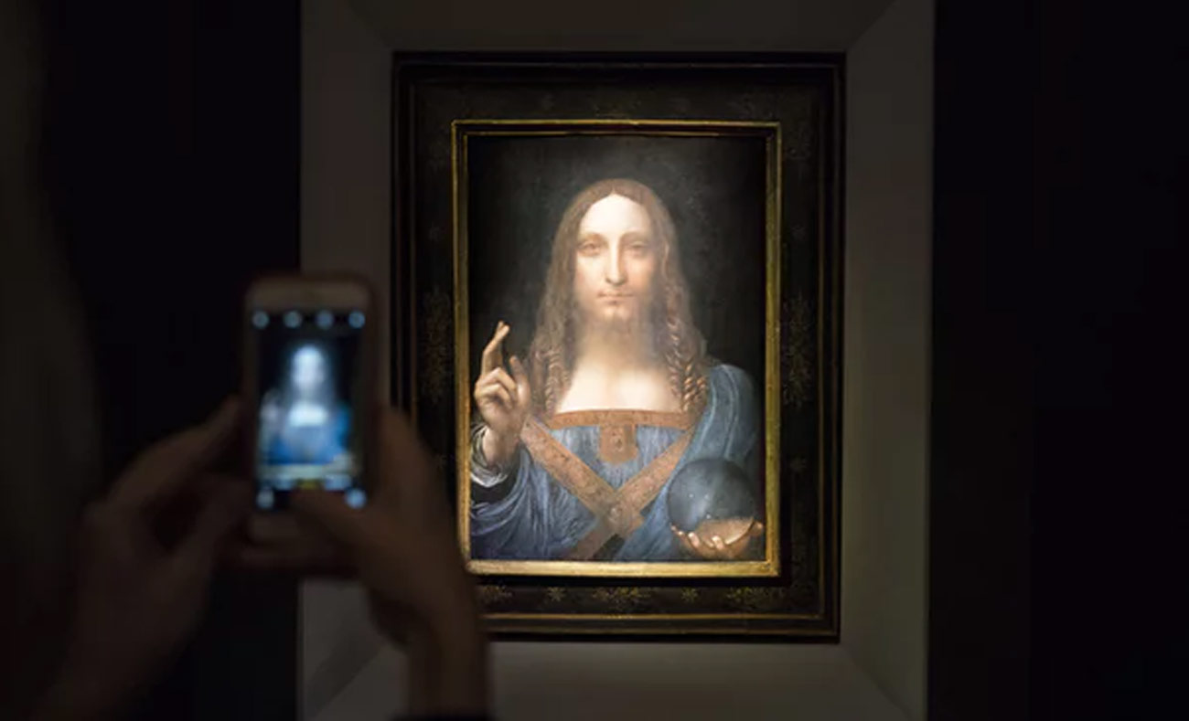 لوحة "المسيح المخلص" لليوناردو دافنشي، والتي بيعت في مزاد علني هذا العام بمبلغ 450 مليون دولار (Getty Images)