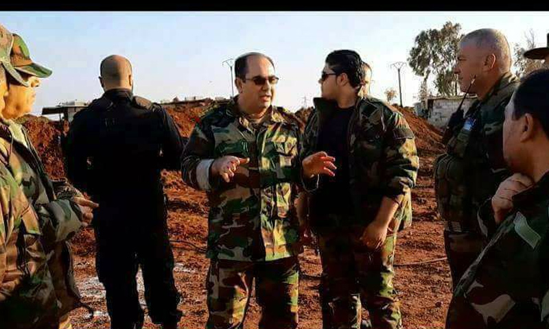 العميد في قوات الأسد وفيق ناصر مع عناصر له في السويداء - (فيس بوك)