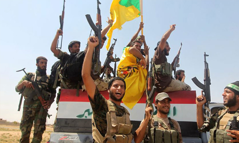 عناصر من الحشد الشعبي في معارك تنظيم الدولة على الحدود السورية العراقية -(رويترز)