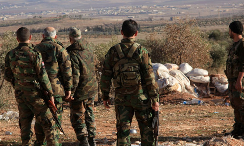عناصر من قوات الأسد في أثناء الحملة العسكرية على درعا - أيار 2018 (انترنت)