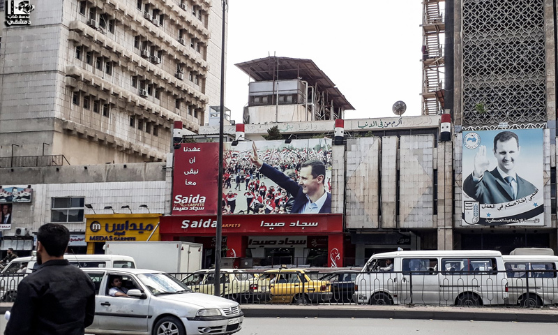 صور رئيس النظام السوري في شارع الثورة وسط دمشق - (عدسة شاب دمشقي)