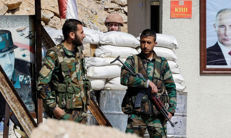 حاجز لقوات الأسد في الغوطة الشرقية (AFP)