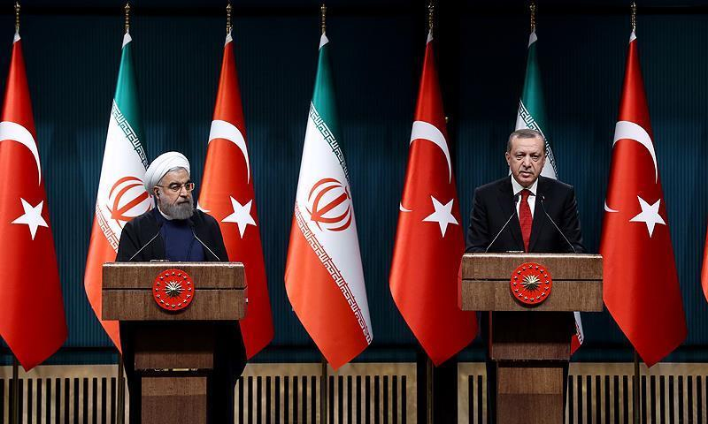 المؤتمر الصحفي المشترك بين الرئيس التركي رجب طيب أردوغان والرئيس الإيراني حسن روحاني- 20 من كانون الأول 2018 (الأناضول)