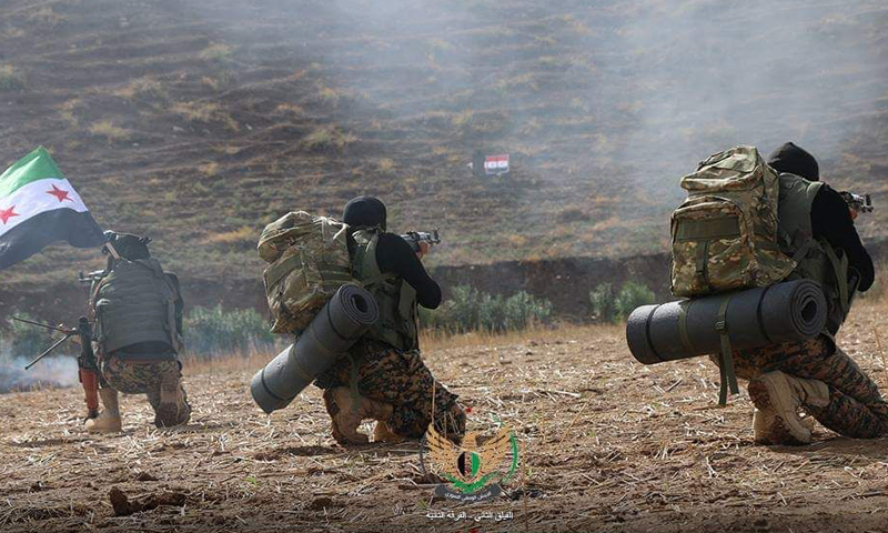 عناصر من فرقة الحمزة المنضوية في الجيش الوطني خلال معسكر تدريبي بريف حلب -(الفيلق الثاني)