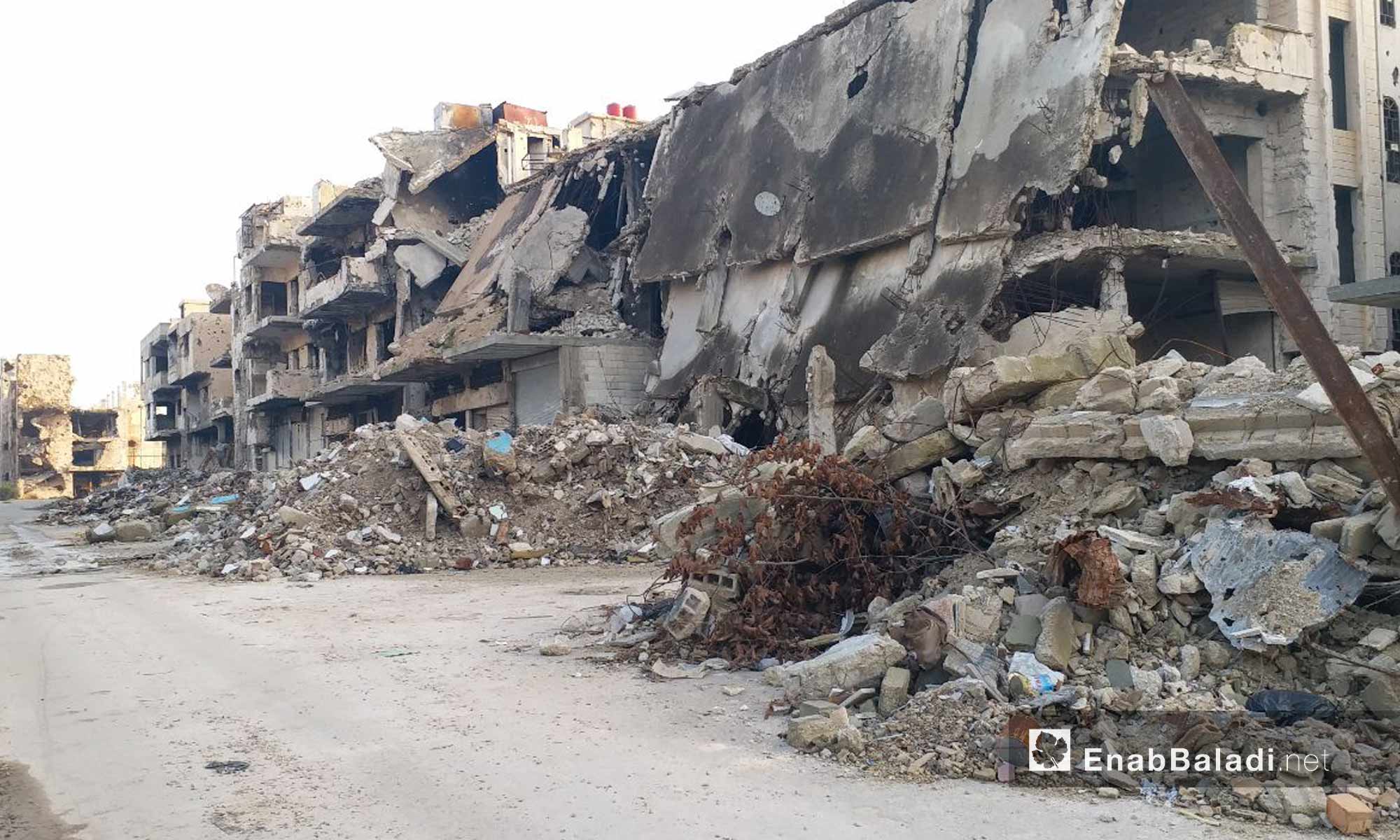 أبنية مهدمة في حي القصور في مدينة حمص - 24 من كانون الثاني 2019 (عنب بلدي)
