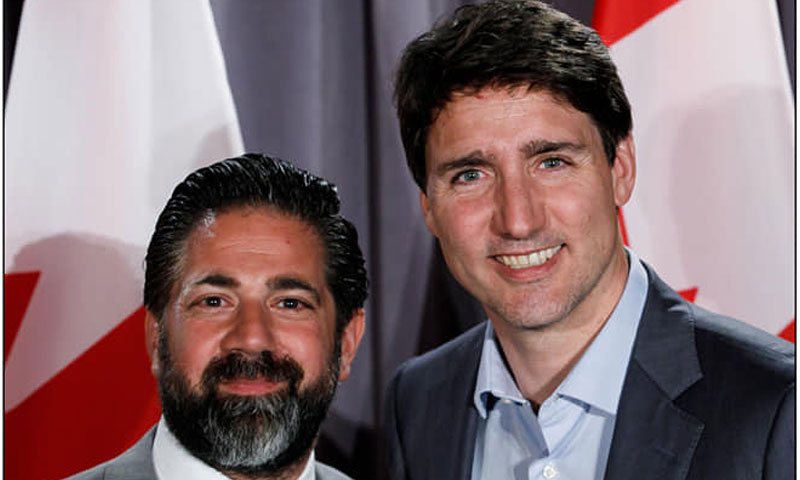 رئيس الوزراء الكندي جاستن ترودو مع رجل الأعمال السوري وسيم الرملي - حزيران 2019 (Waseem Ramli فيس بوك)