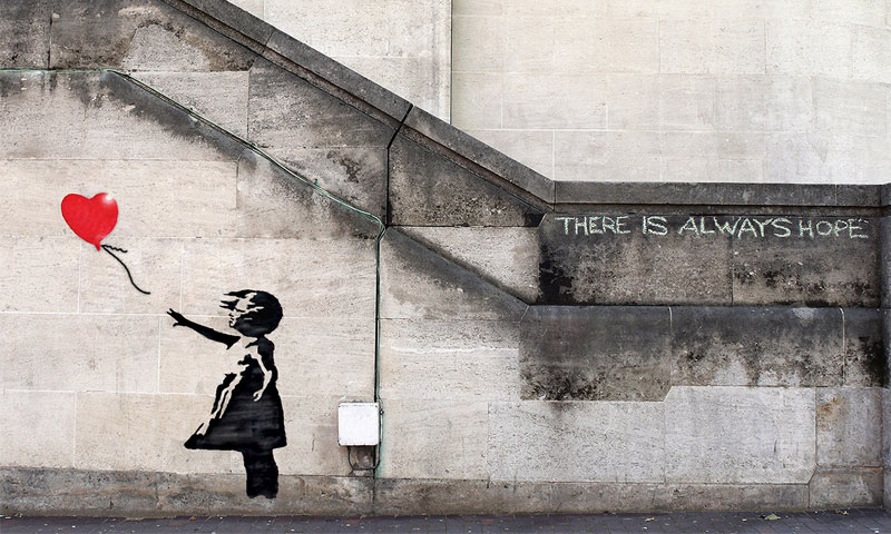 جدارية الفتاة مع البالون لفنان الشارع البريطاني "بانكسي" (Banksy)