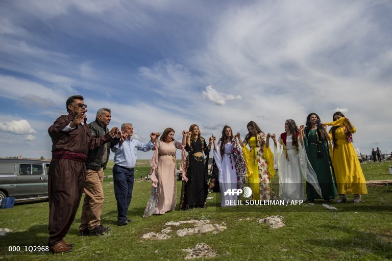 الاحتفال بعيد النوروز في بريف بلدة القحطانية بمحافظة الحسكة، 21 آذار 2020، AFP