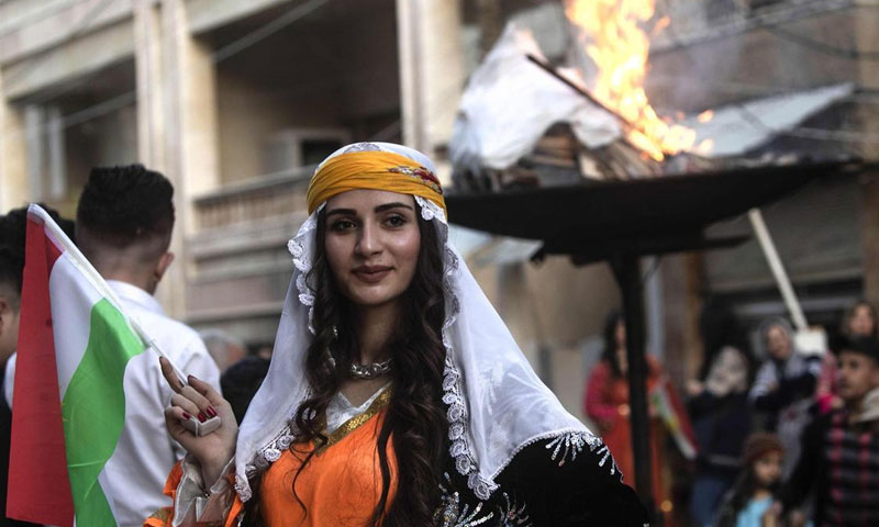 احتفالات عيد "النوروز" في شمال شرقي سوريا- 21 من آذار (AFP)