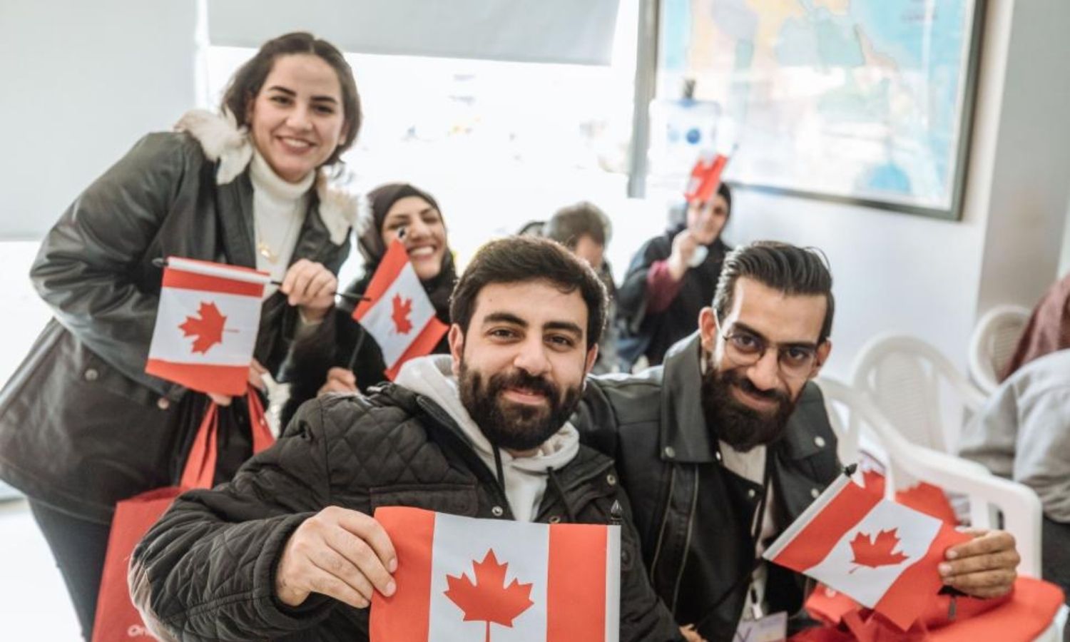 مجموعة من اللاجئين الذين سيتم إعادة توطينهم قريبًا في كندا - 2023 (İOM)