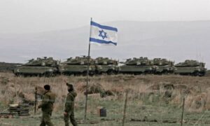 دبابات إسرائيلية خلال مناورة عسكرية في مرتفعات الجولان السوري المحتل- 7 من كانون الأول  2021 (AFP)