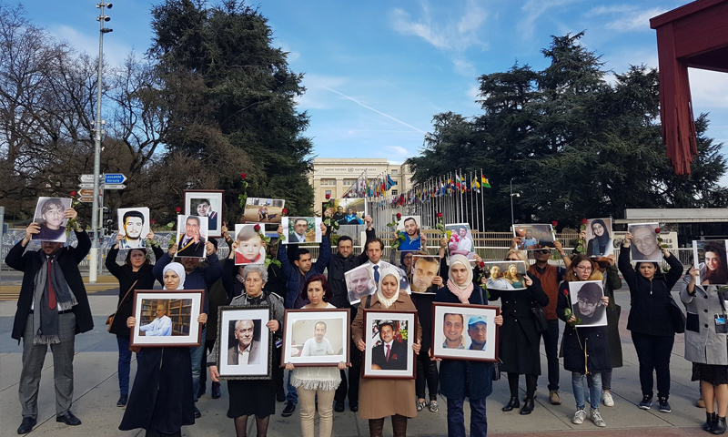 Syrian women whose family members have been detained or victims of enforced disappearances organize a protest in front of the UN building in Geneva, 23 February 2017 (Syrian Campaign)