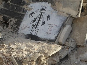رسم يخلد مجزرة آل جنيدي في حي الوعر الحمصي
