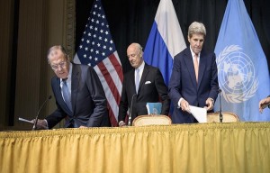 From left, Russian Foreign Minister Sergei Lavrov, UN Special Envoy for Syria Staffan de Mistura and Secretary of State John Kerry arrive for a news conference in Vienna, Austria, Friday, Oct. 30, 2015. The U.S., Russia and more than a dozen other nations have directed the U.N. to begin a new diplomatic process with Syria's government and opposition with the goal of reaching a nationwide cease-fire and political transition. (Brendan Smialowski/Pool via AP)