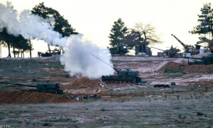Tanks stationed at a Turkish army position near the Oncupinar crossing gate close to the town of Kilis, south central Turkey, fire towards the Syria border, on February 16, 2016.
Turkey is in favour of a ground operation into neighbouring Syria only with its allies, a senior Turkish official told reporters in Istanbul. / AFP / BULENT KILIC        (Photo credit should read BULENT KILIC/AFP/Getty Images)