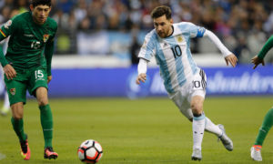 Bolivia's Pedro Azogue (L) and Argentina's Lionel Messi vie for the ball during the Copa America Centenario football tournament match in Seattle, Washington, United States, on June 14, 2016.  / AFP PHOTO / Jason REDMONDJASON REDMOND/AFP/Getty Images ** OUTS - ELSENT, FPG, CM - OUTS * NM, PH, VA if sourced by CT, LA or MoD **