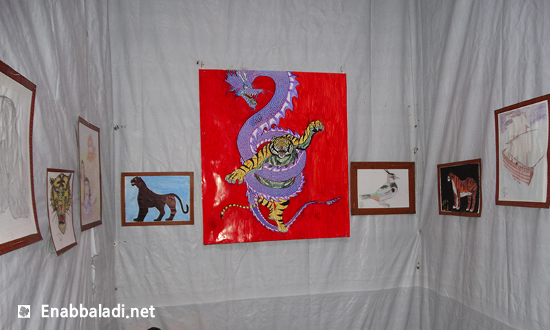 معرض رسومات في حي الوعر المحاصر في مدينة حمص- الثلاثاء 21 حزيران (عنب بلدي)