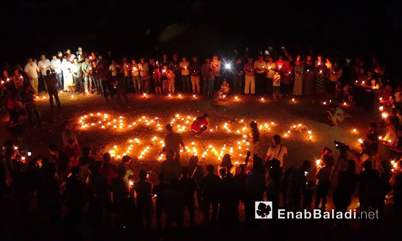 وقفة بالشموع تخليدًا لضحايا مجزرة القامشلي- الخميس 4 آب (عنب بلدي)