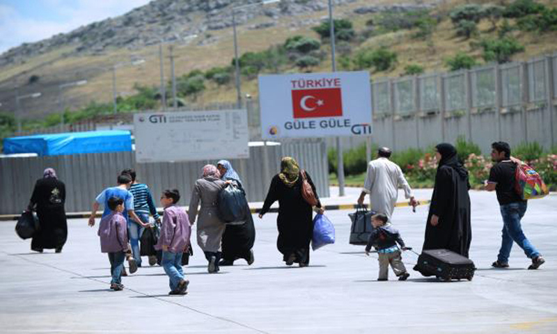 تعبيرية: سوريون يتجهون من تركيا إلى سوريا (إنترنت)