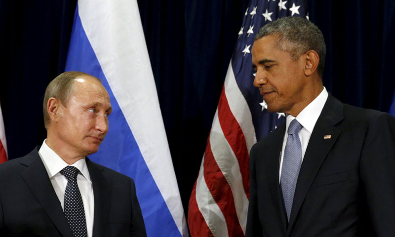 الرئيس الأمريكي السابق باراك أوباما مع نظيره الروسي - (انترنت)