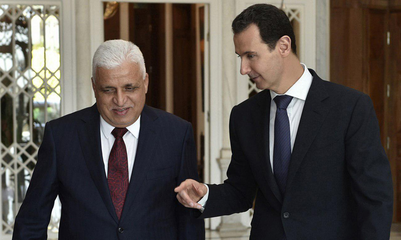 بشار الأسد إلى جانب فالح الفياض مبعوث رئيس الوزراء العراقي- الخميس 18 أيار (رئاسة الجمهورية)
