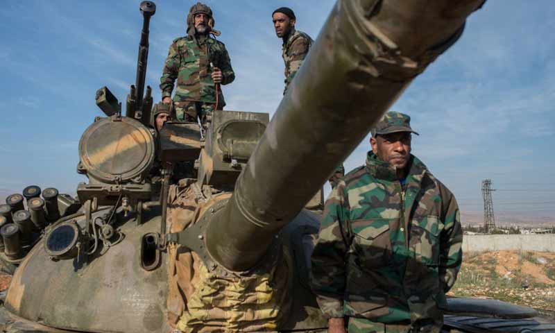 عناصر من قوات الأسد في محيط الغوطة الشرقية - (سبوتنيك)