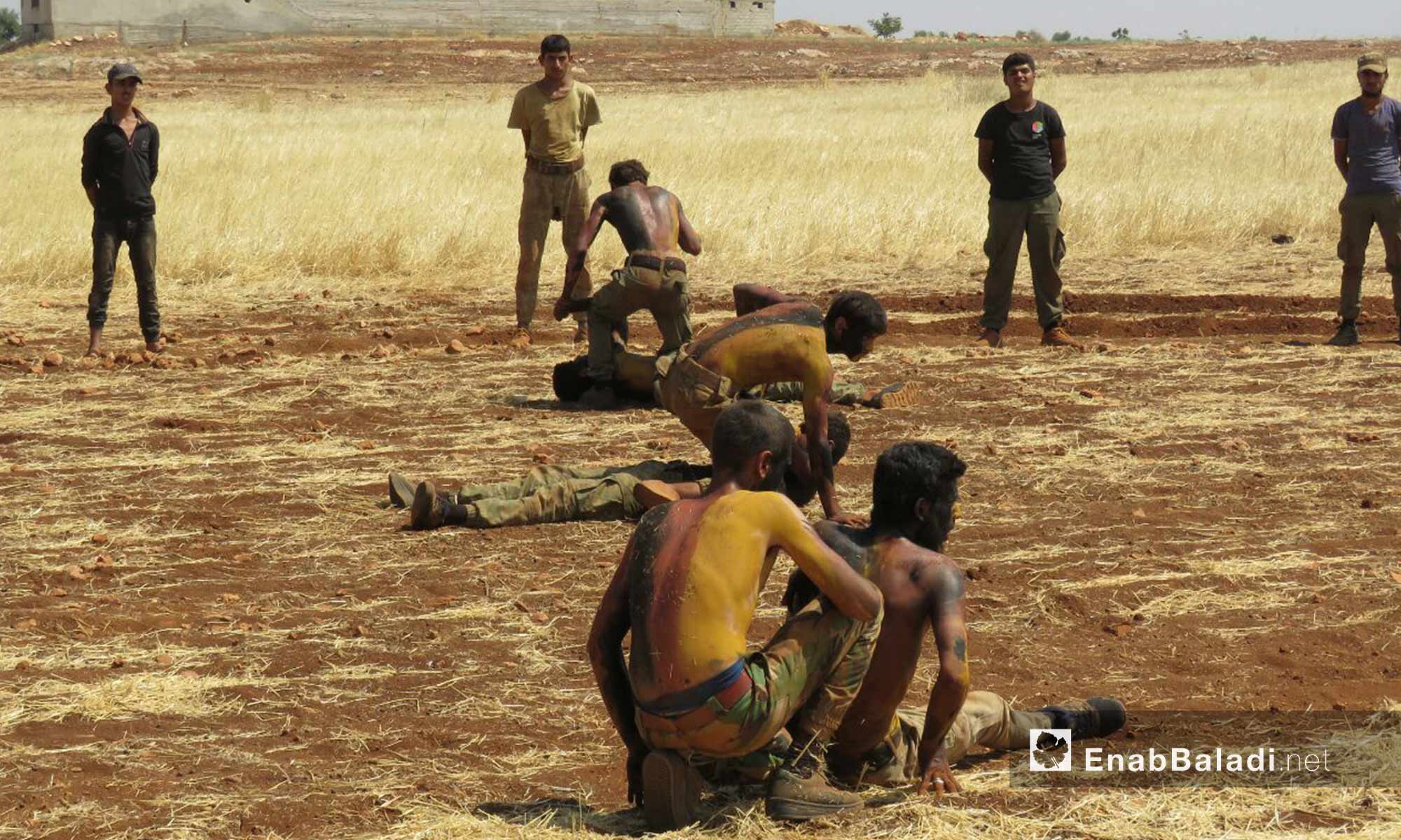 جانب من تدريبات عناصر الجيش السوري الحر من داخل معسكرات ريف حماة الشمالي - 11 آب 2017 (عنب بلدي)