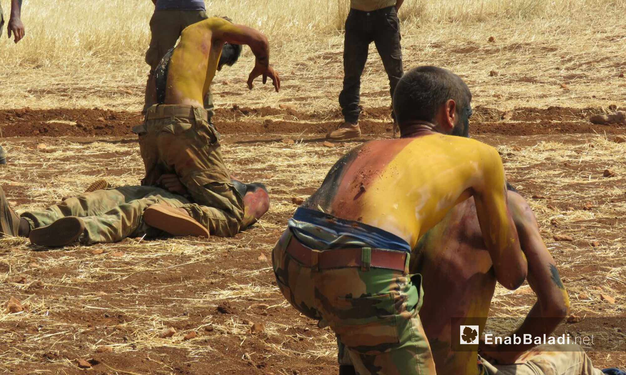 جانب من تدريبات عناصر الجيش السوري الحر من داخل معسكرات ريف حماة الشمالي - 11 آب 2017 (عنب بلدي)