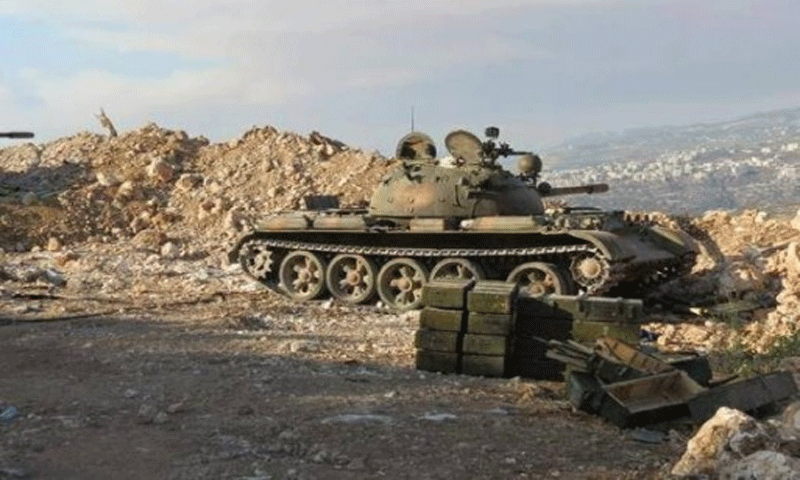 دبابة لقوات الأسد في ريف اللاذقية الشمالي (إنترنت)