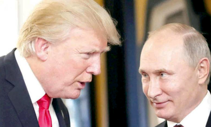 الرئيسان الأمريكي والروسي في فيتنام - 11 تشرين الثاني 2017 (Reuters)
