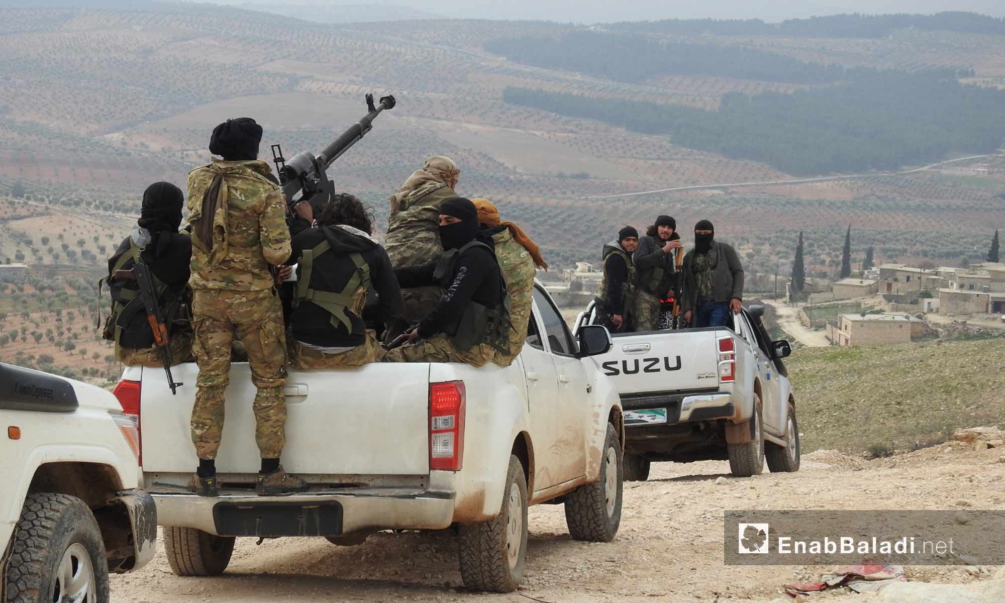 عناصر من الجيش الحر خلال المعارك الدائرة على محور شران شمالي عفرين - 20 شباط 2018 (عنب بلدي)