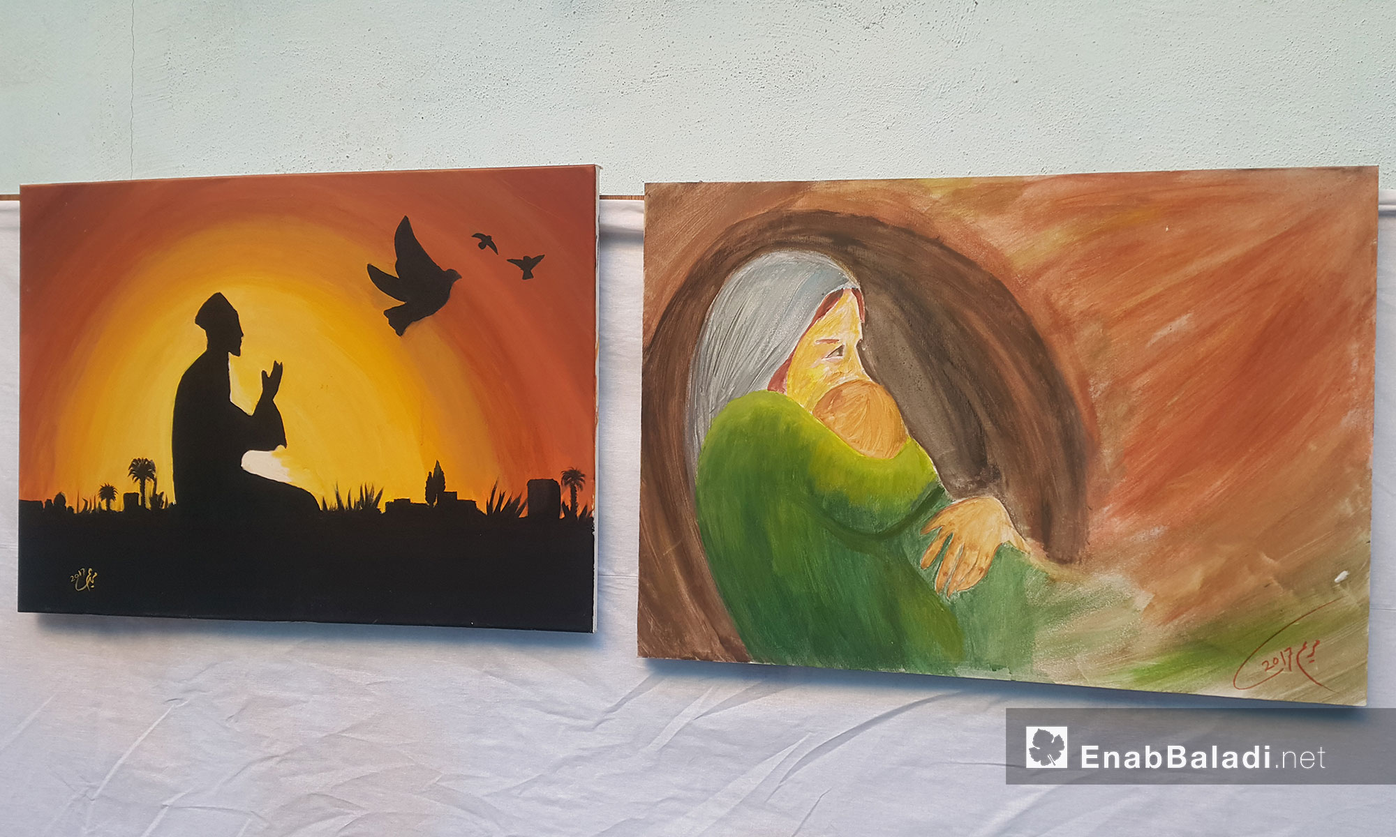 لوحات مشاركة في معرض "إنسان" بأيدٍ سورية في أورفة التركية - 2 شباط 2018 (عنب بلدي)