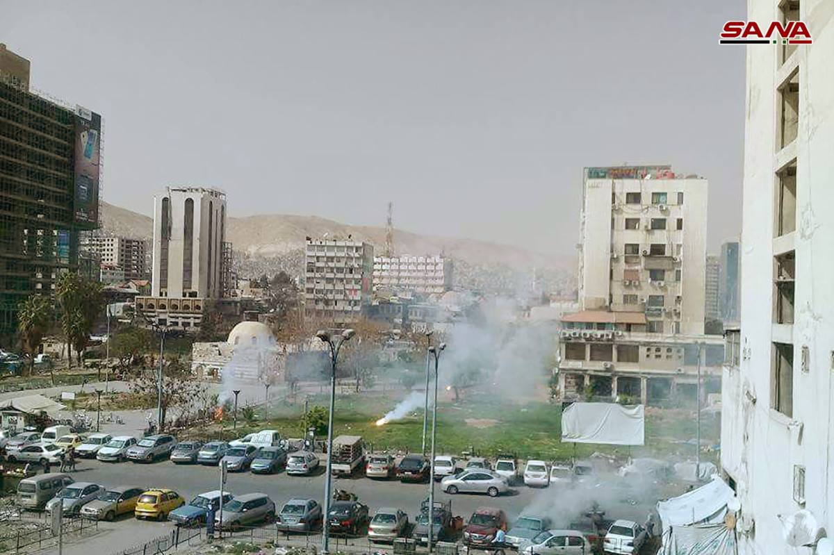 آثار القصف الذي استهدف مدينة دمشق - 22 آذار 2013 (سانا)