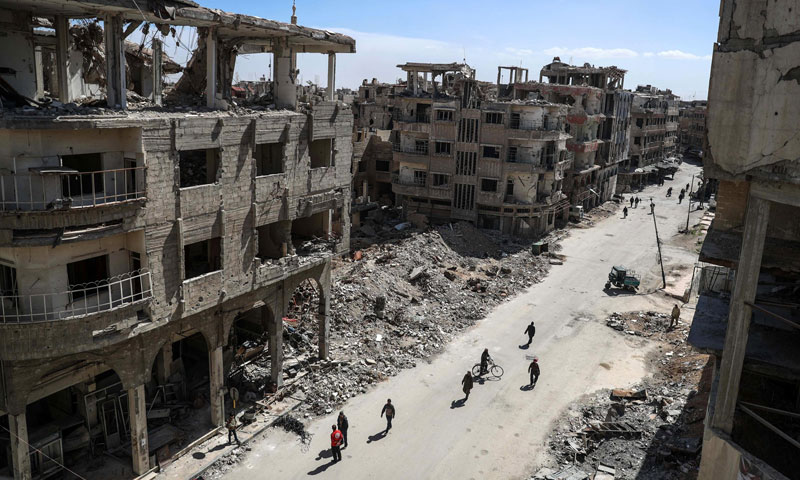 مبان مدمرة في الغوطة الشرقية لدمشق (EPA)