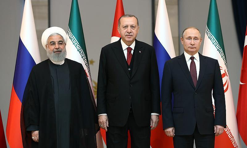 الرؤساء رجب طيب أردوغان وفلاديمير بوتين وحسن روحاني (الأناضول)