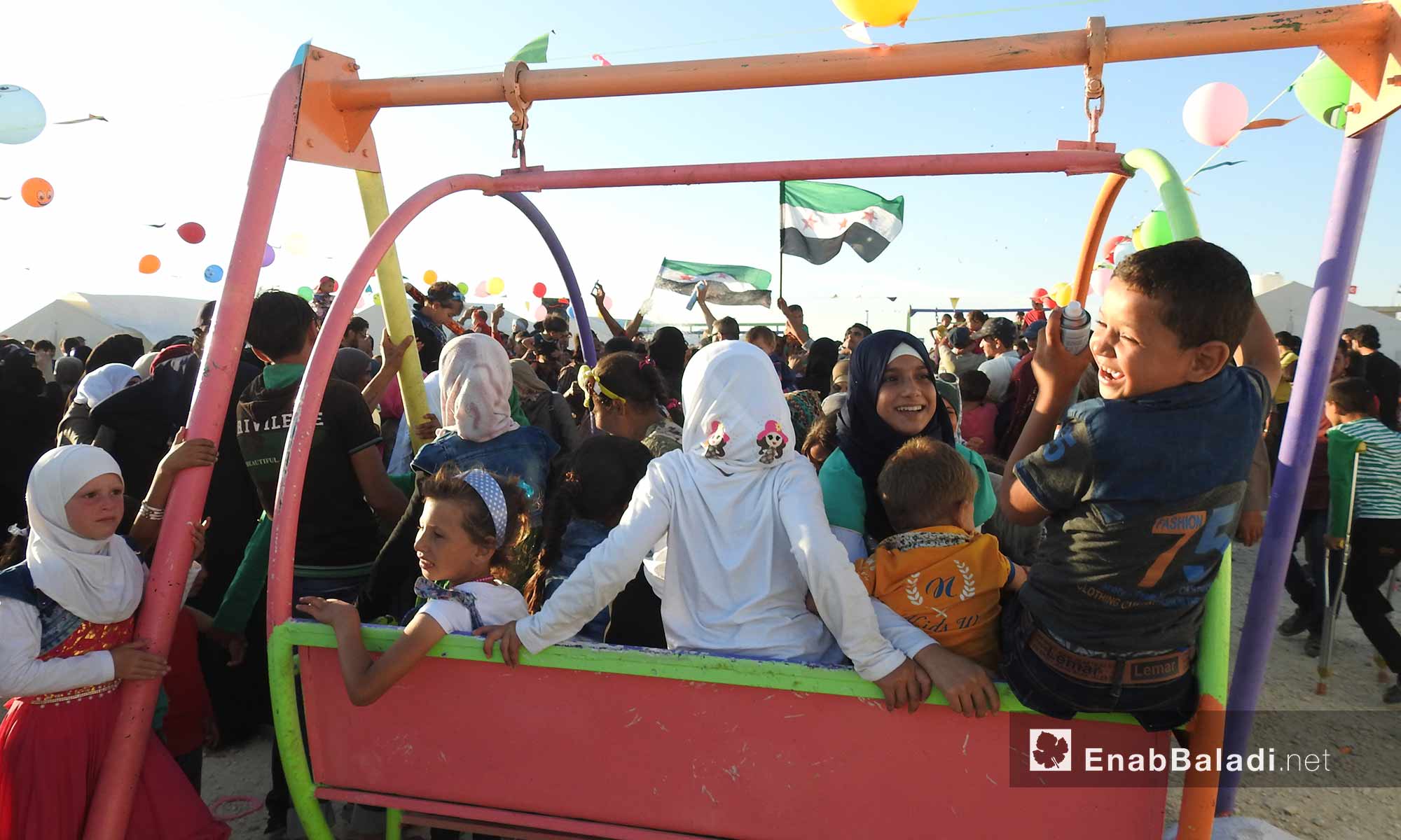 احتفال الأطفال في ثالث أيام عيد الفطر في مخيم البل بريف حلب الشمالي - 17 حزيران 2018 (عنب بلدي) 