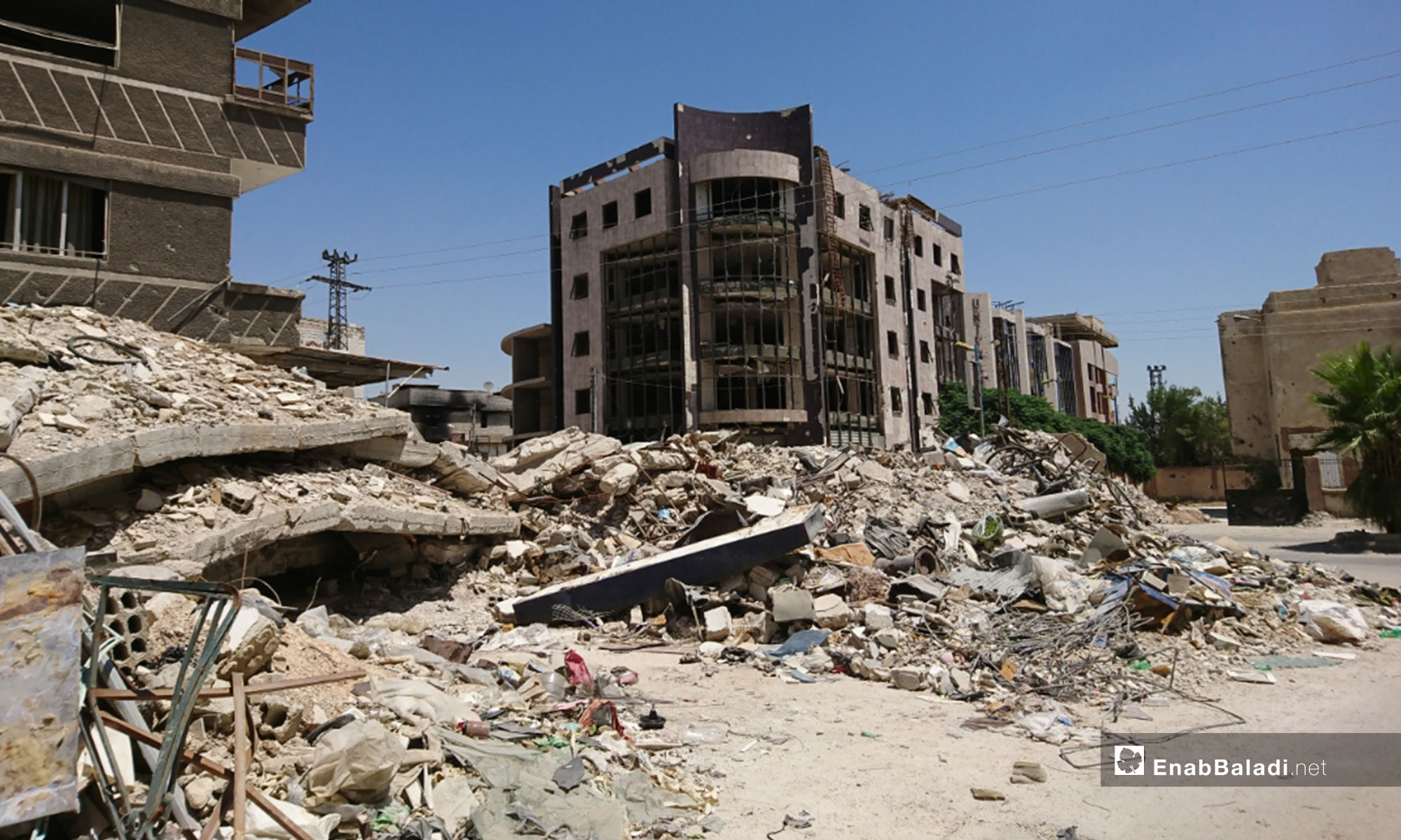 آثار الدمار في مدينة كفر بطنا بالغوطة الشرقية - 11 من آب 2018 (عنب بلدي)